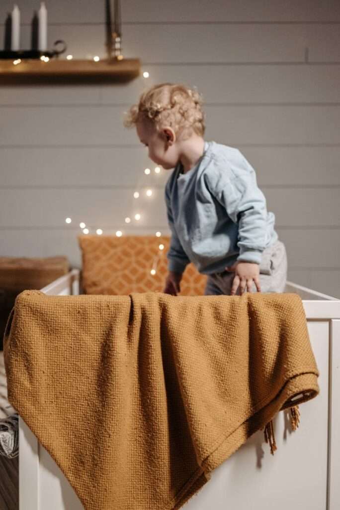 Toddler Inside his Crib